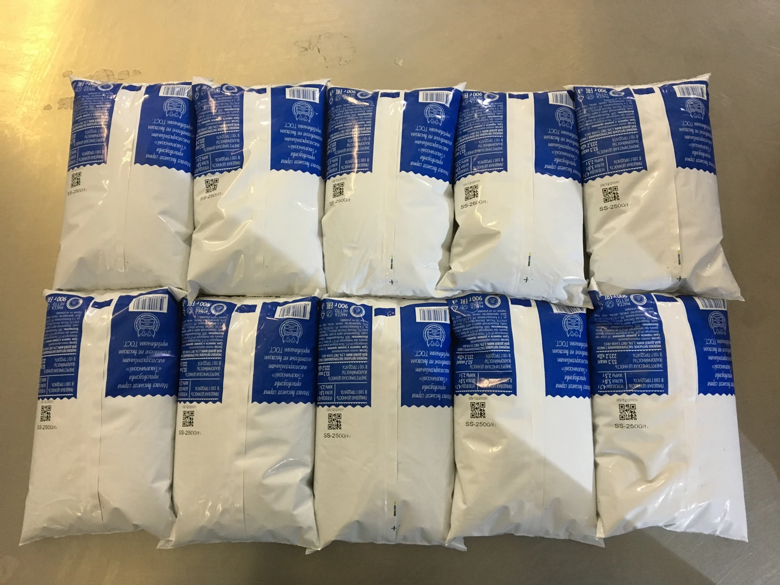 Marked milk packs each carrying a unique code